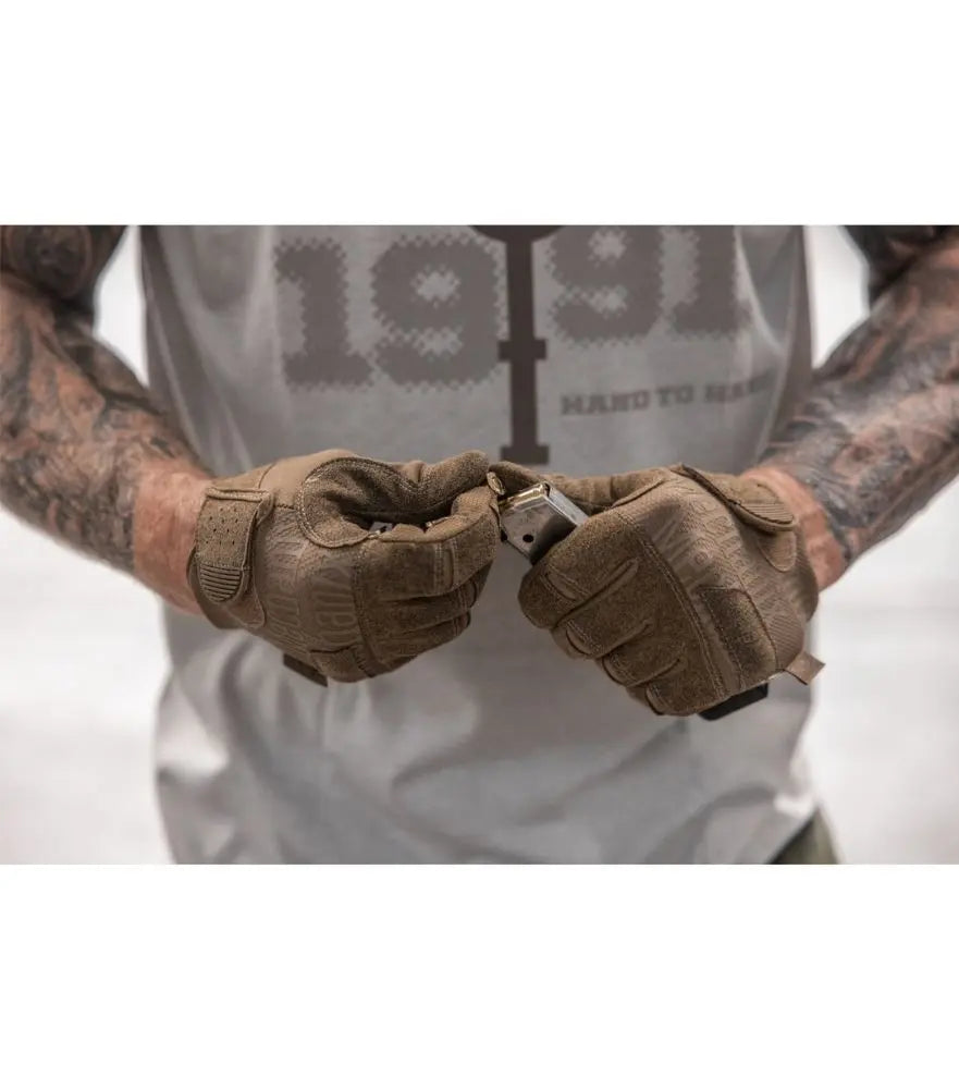 Mechanix Wear tactical gloves used for controlled pistol magazine loading