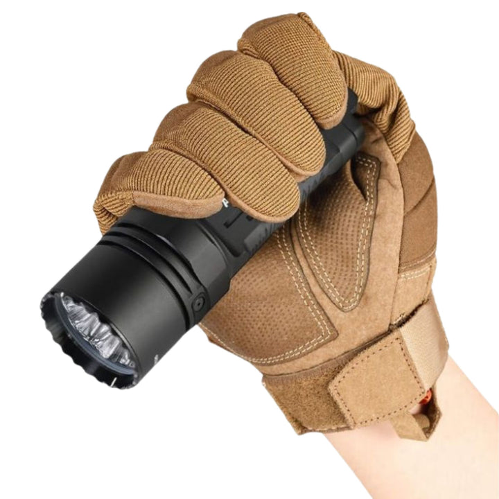 Acebeam X20 high output flashlight held in gloved hand showing grip