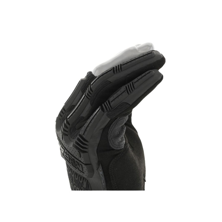 Close-up of MPF-55 M-Pact glove showing segmented knuckle armor and articulated trigger finger mobility