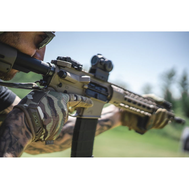 Shooter wearing Mechanix Original Multicam Gloves holding AR-15 with strong weapon control