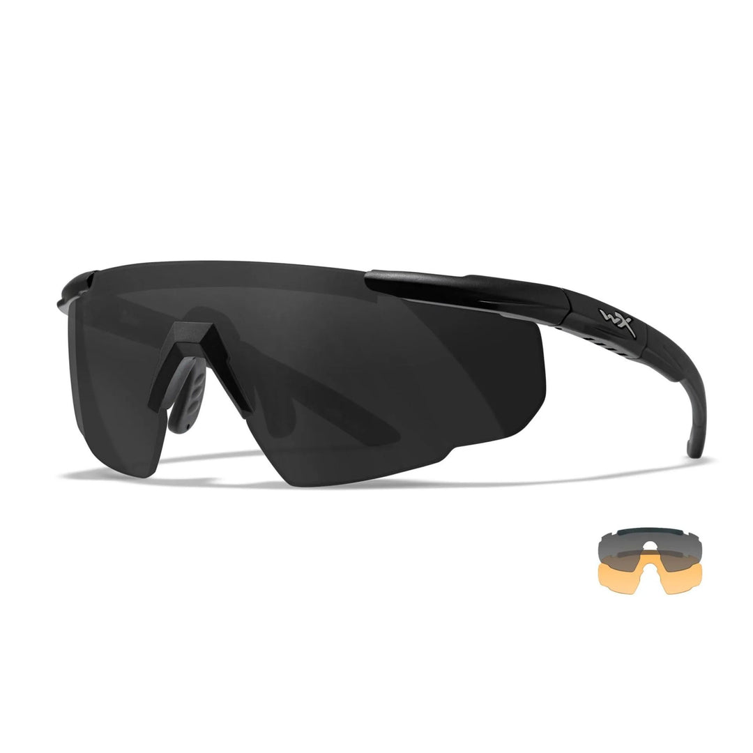 Angled view of Wiley X Saber-Advanced safety glasses with smoke lens and black frame for professional-grade eye protection.