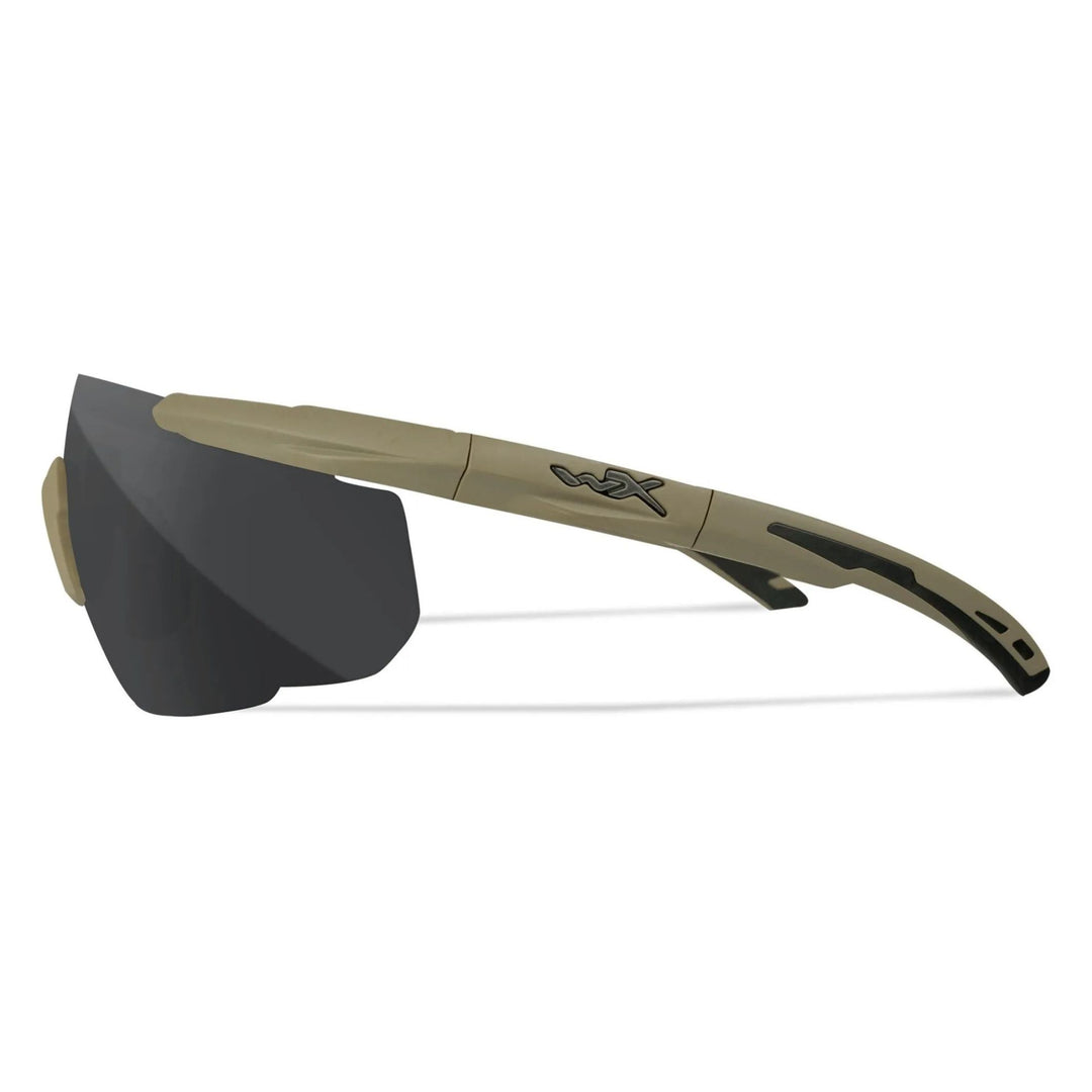 Side profile of Wiley X Saber Advanced sunglasses in matte tan, featuring textured temples and the iconic WX logo for enhanced grip and style.